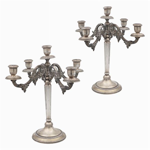 Pair of silver candelabra  (Italy, 20th century)  - Auction FINE SILVER AND THE ART OF THE TABLE - Colasanti Casa d'Aste