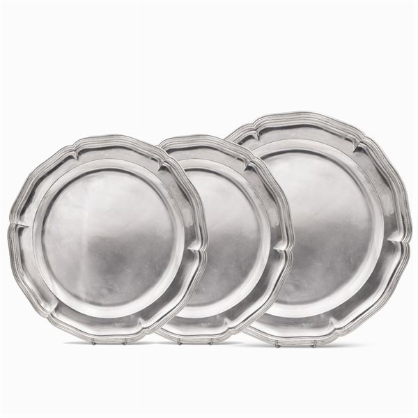 Three silver serving plates