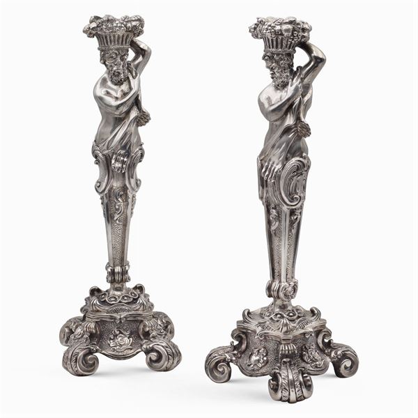 Coppia di candelieri in argento