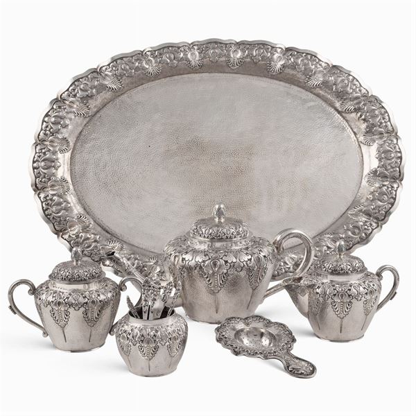 Silver tea service (12)  (Oriental manufacture, 20th century)  - Auction FINE SILVER AND THE ART OF THE TABLE - Colasanti Casa d'Aste