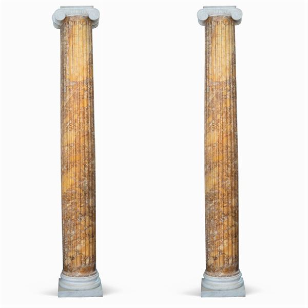 Pair of large Breccia of Siena marble columns