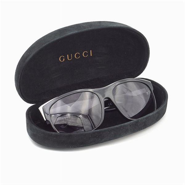 Gucci two vintage sun glasses 2000s circa Auction FASHION