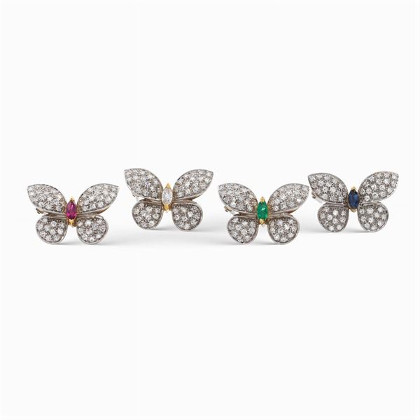 Four 18kt two color gold and diamond butterfly brooches