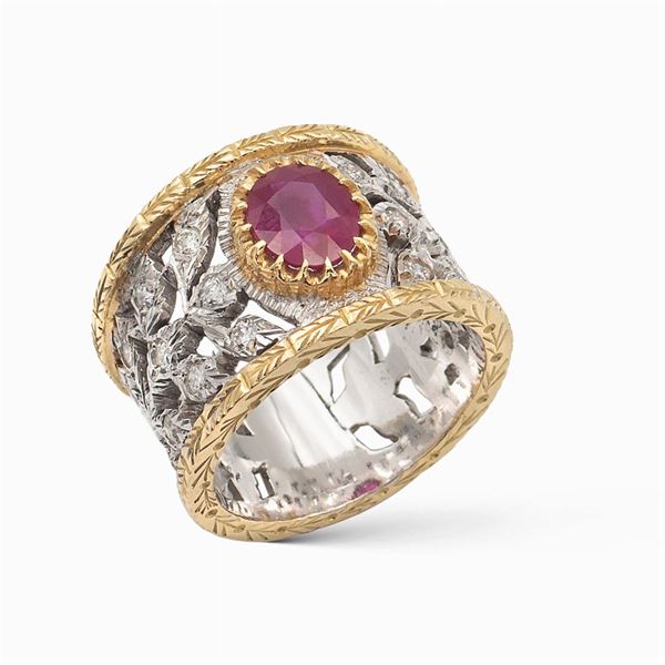 18kt yellow and white gold ring with natural oval ruby 1,60 ct