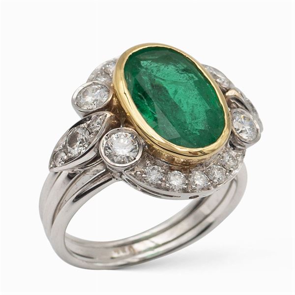 18kt white and yellow gold ring with natural emerald 3,48 ct