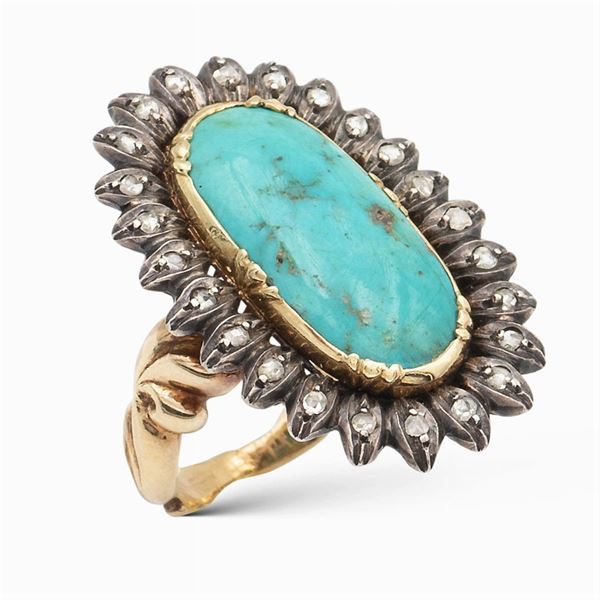 Anello in oro giallo e argento con turchese naturale