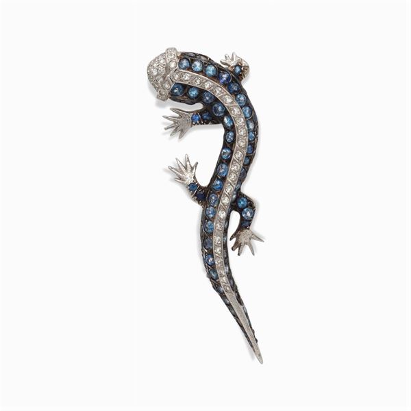 18kt white gold, sapphires and dimond geco brooch