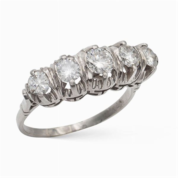 Anello rivière in platino e diamanti