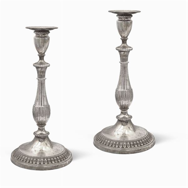 Pair of silver plated metal candlesticks