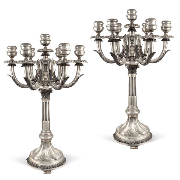Pair of seven-lights silver candelabra
