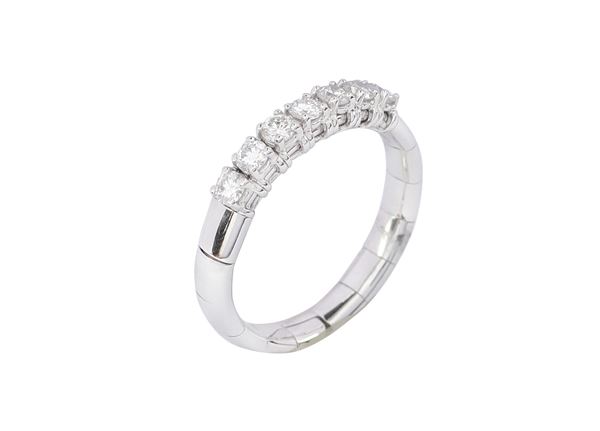 An 18k white gold and diamond riviere ring