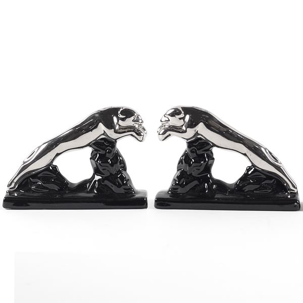 Due sculture pantere fermalibri in ceramica nera e argento
