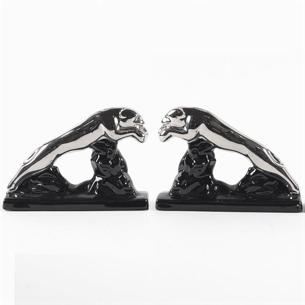 Due sculture pantere fermalibri in ceramica nera e argento
