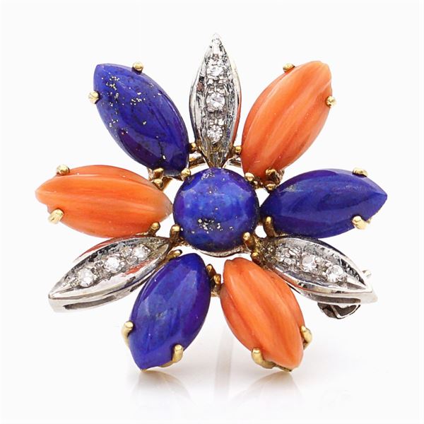 Spilla fiore in oro a due colori 18kt