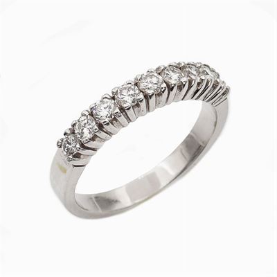Anello Riviere in Oro Bianco 18kt con Nove Diamanti