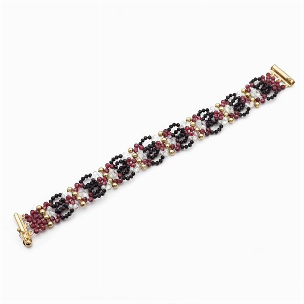 18kt yellow gold, rock crystal, black onyx and garnets bracelet  - Auction TIMED AUCTION  JEWELS AND WATCHES - Colasanti Casa d'Aste