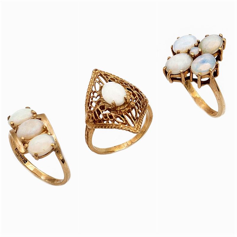 Tre Anelli in Oro Giallo 14kt e Opali Arlecchino