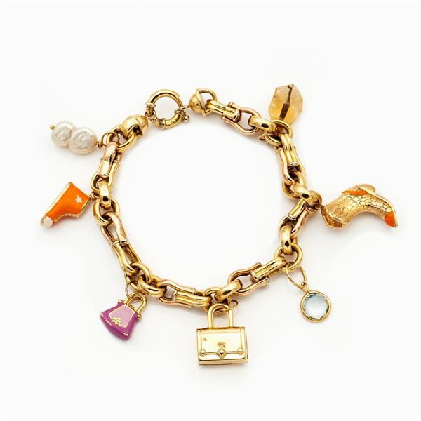 Bracciale charms in oro giallo 18kt  - Asta GIOIELLI E OROLOGI  - Colasanti Casa d'Aste