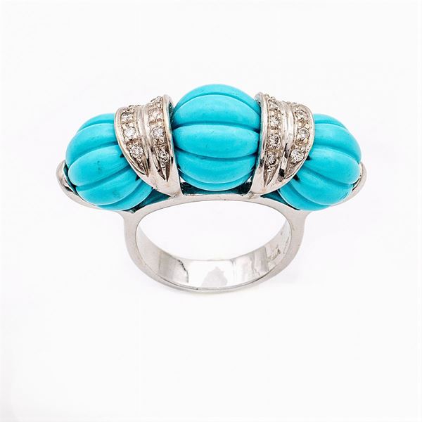 Anello in oro bianco 18kt con turchesi