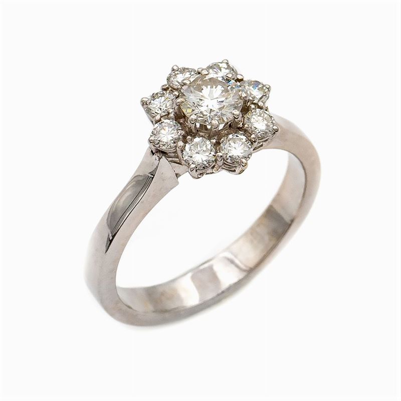 Anello Fiore in Oro Bianco 18kt con un Diamante
