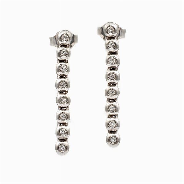 18kt white gold and diamond tennis earrings