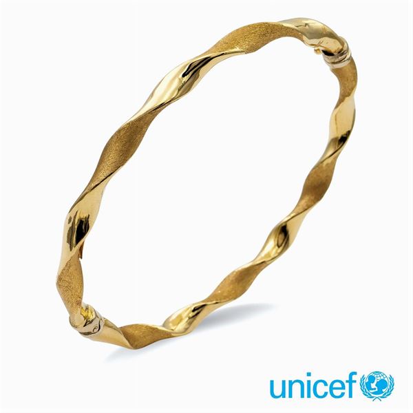 &#9830;Bracciale a manetta in oro giallo 18kt  - Asta GIOIELLI | OROLOGI | FASHION VINTAGE - Colasanti Casa d'Aste