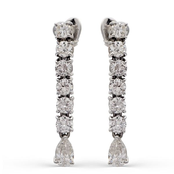 18kt white gold and diamond riviere pendant earrings