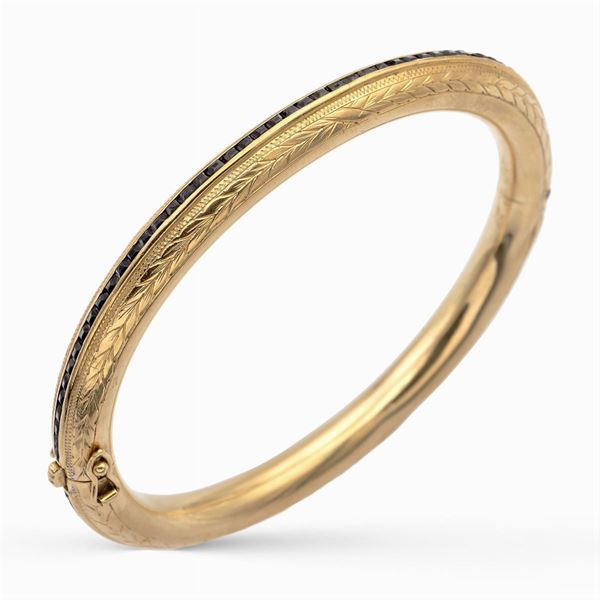 Bracciale borbonico a manetta in oro giallo 9kt