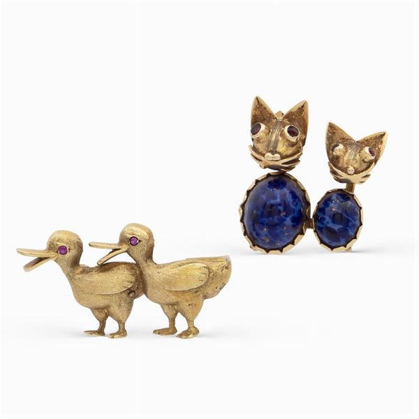 Due spille animalier in oro giallo 18kt