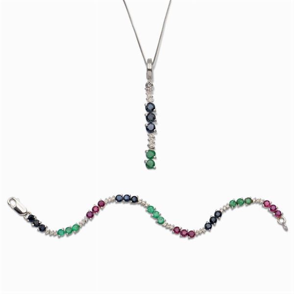 18kt white gold, round sapphires, rubies and emeralds bracelet and pendant