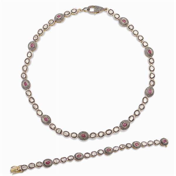 Antica parure in oro e argento con diamanti e rubini