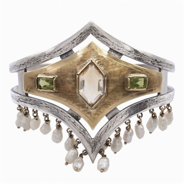Bracciale a schiava in oro giallo e argento