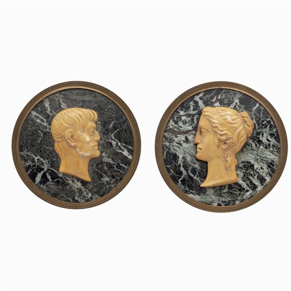 Pair of circular marble plaques