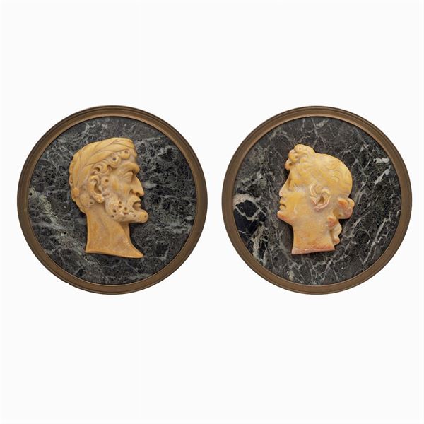 Pair of circular marble plaques