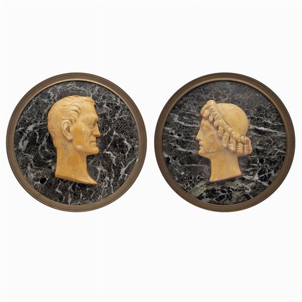 Pair of circular marble plaques