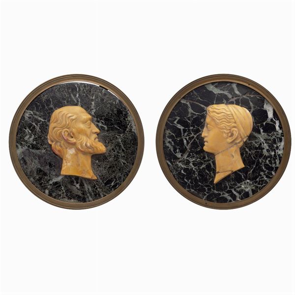 Pair of circular marble plaques