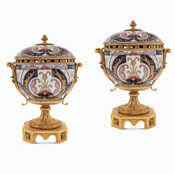 Pair of Imari porcelain and gilt bronze potiches