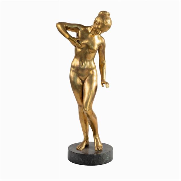Scultura in bronzo dorato