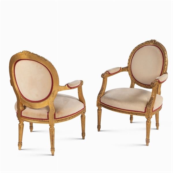 Pair of gilt wood armchairs