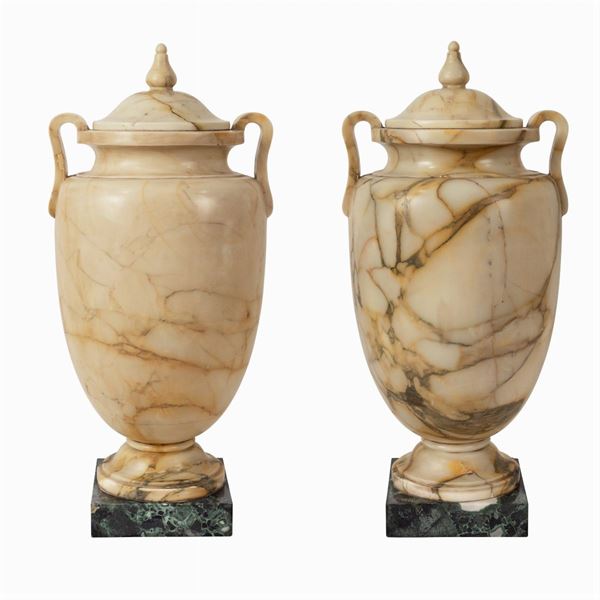 Pair of yellow Siena marble vases