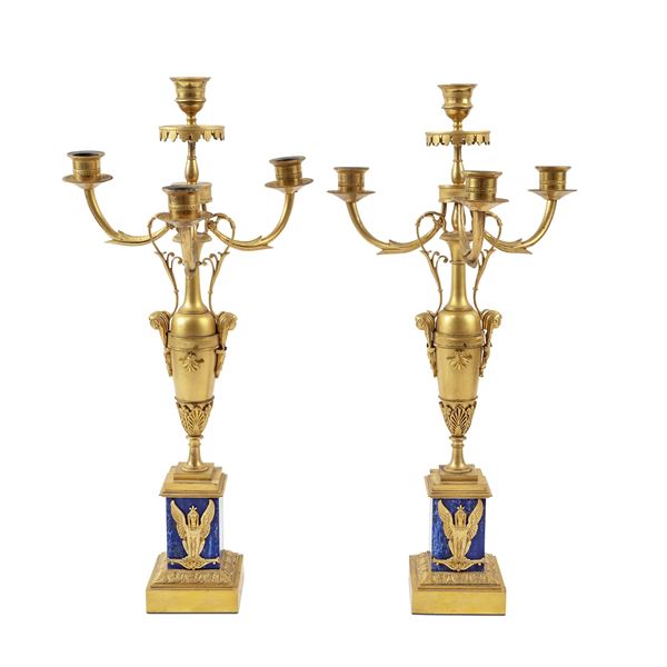 Coppia di candelabri in bronzo dorato e lapislazzulo a quattro luci