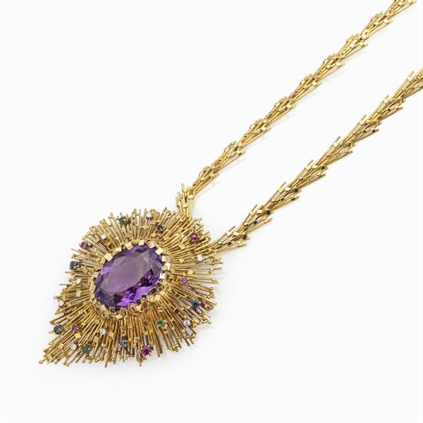 Pendente e spilla scultura in oro giallo 18kt con grande ametista