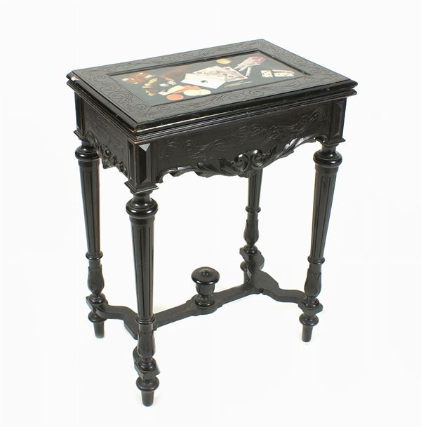 A French ebonized wood playing table