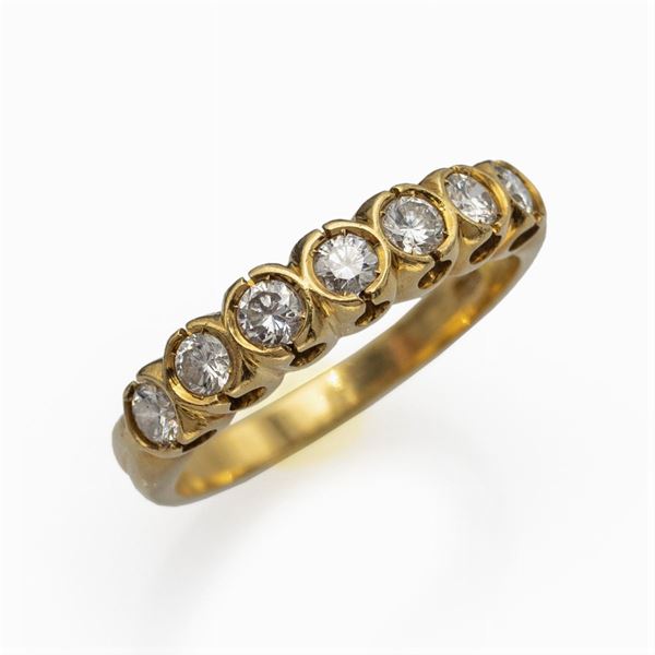 Anello riviere in oro giallo 18kt e diamanti