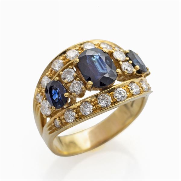 Anello a fascia in oro giallo 18kt zaffiri e diamanti