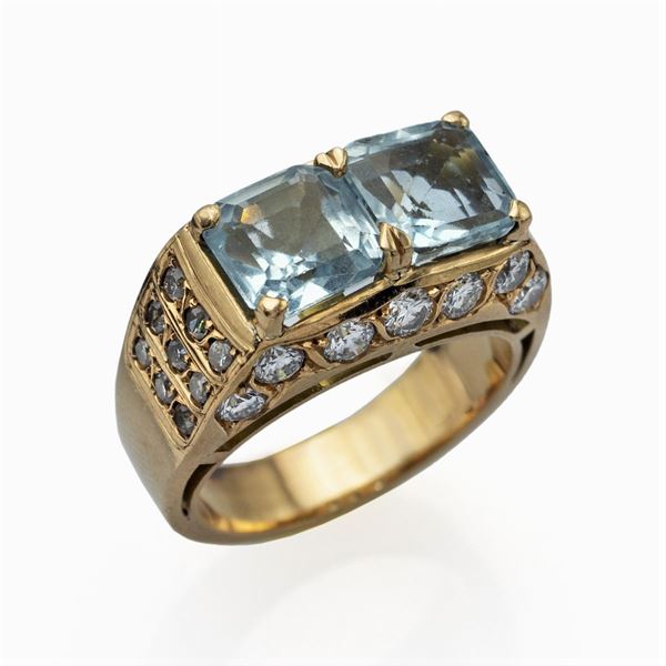 Anello in oro giallo 18kt acquamarine e diamanti