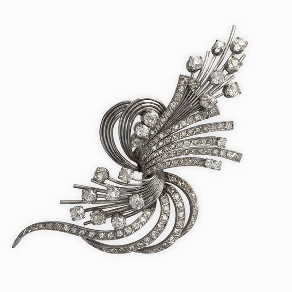 Spilla nastro in oro bianco e diamanti