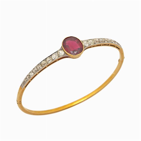 Antico bracciale a manetta in oro giallo e argento