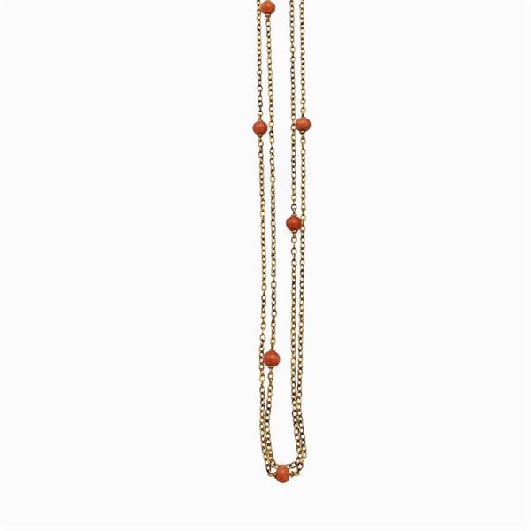 Long 18kt yellow gold and coral spheres necklace