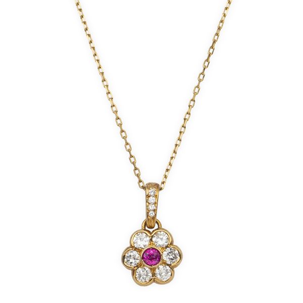 18kt yellow gold flower pendant with ruby and diamonds